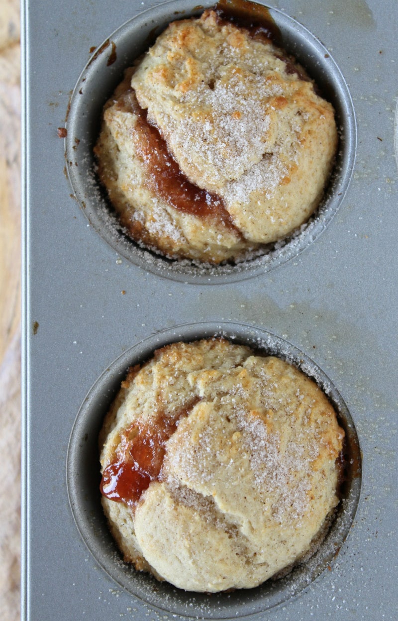 overhead shot of strawberry cinnamon muffins in a muffin tin