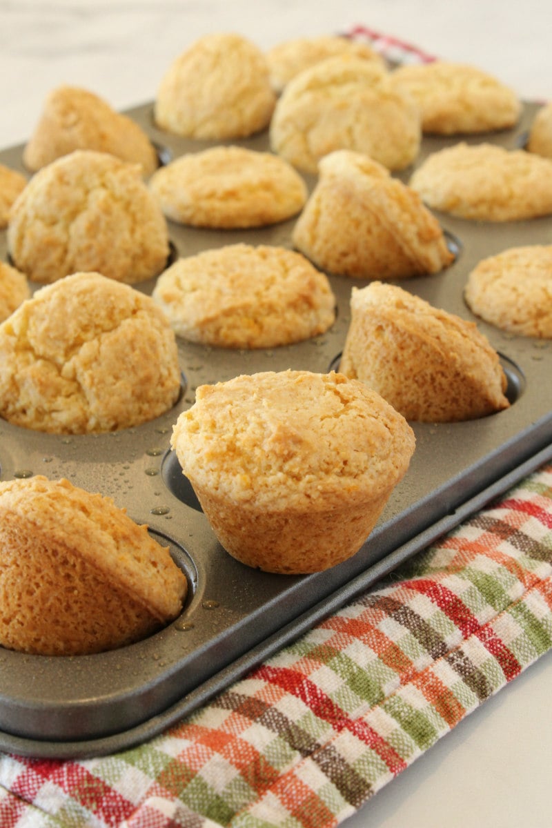 orange mini muffins in pan