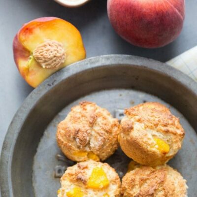 peach and brown sugar muffins in a pan