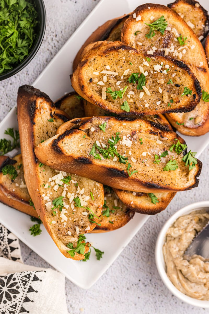 peppery grilled garlic bread on a plate