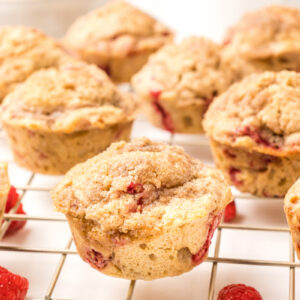 raspberry muffins on cooling rack