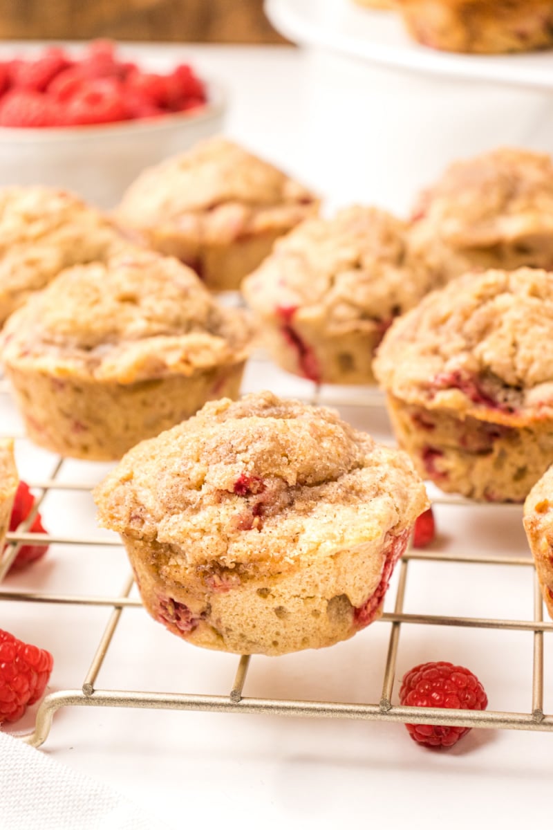raspberry muffins on cooling rack