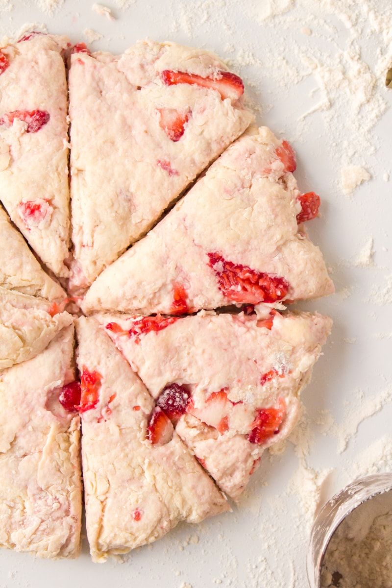 strawberry scone dough cut into wedges
