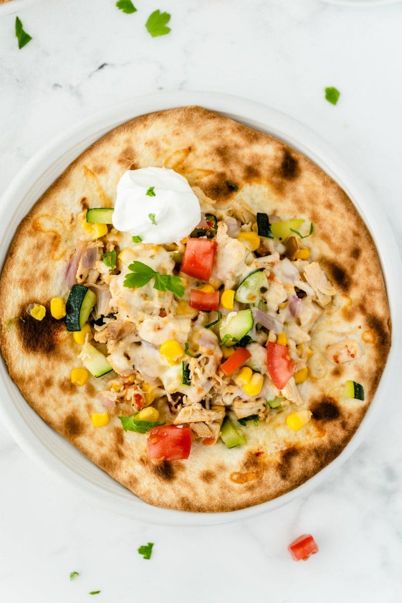 chicken and summer vegetable tostada overhead shot