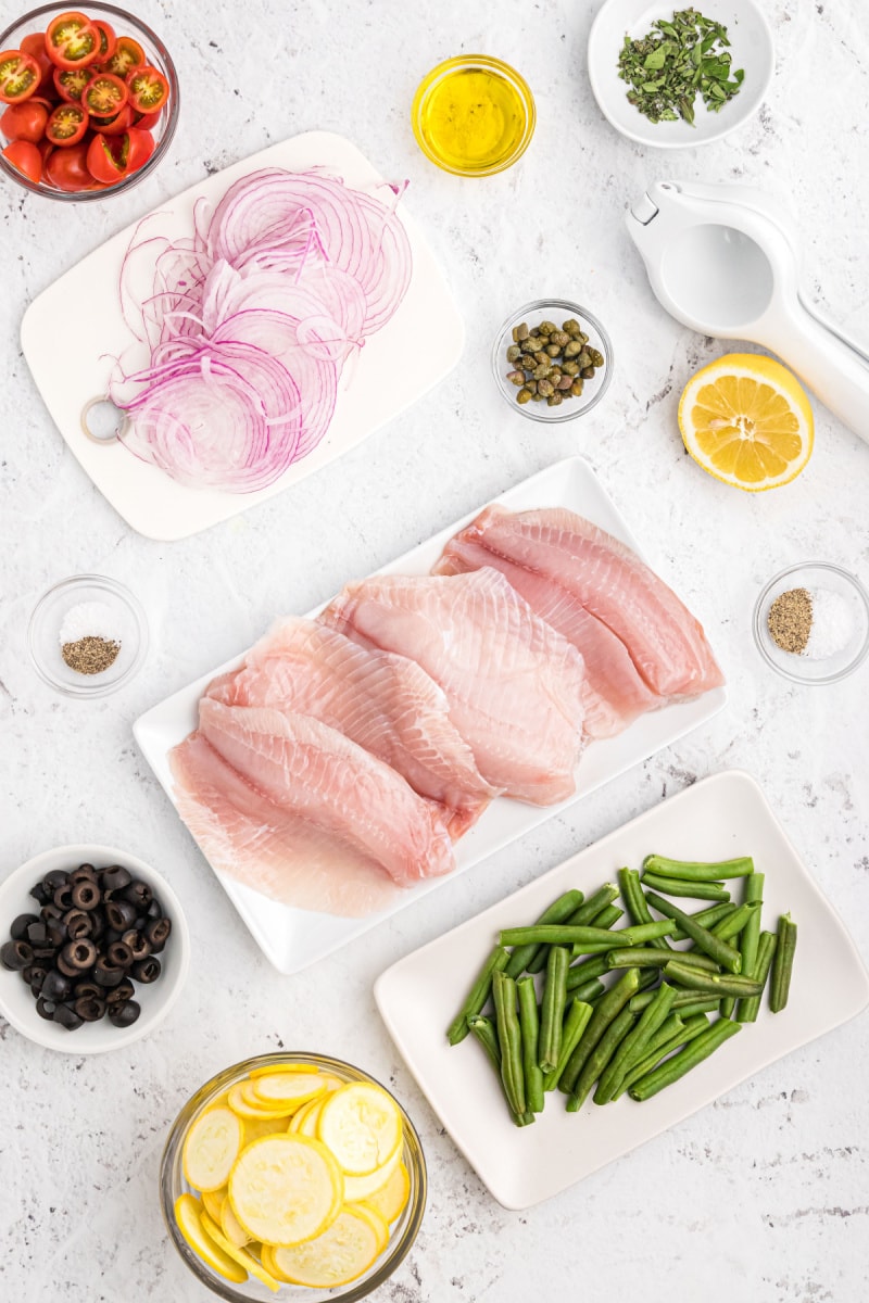 ingredients displayed for making tilapia and summer vegetable grill packets