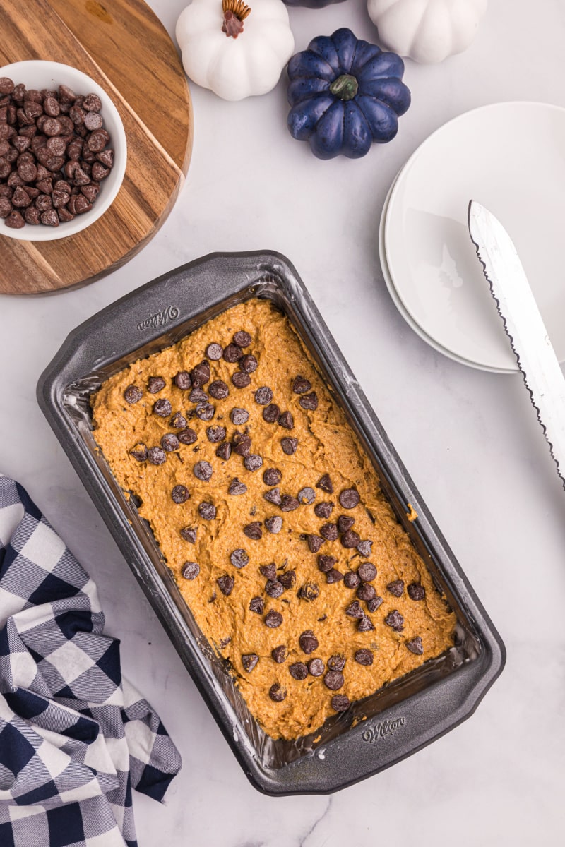 loaf pan of chocolate chip pumpkin bread ready for oven