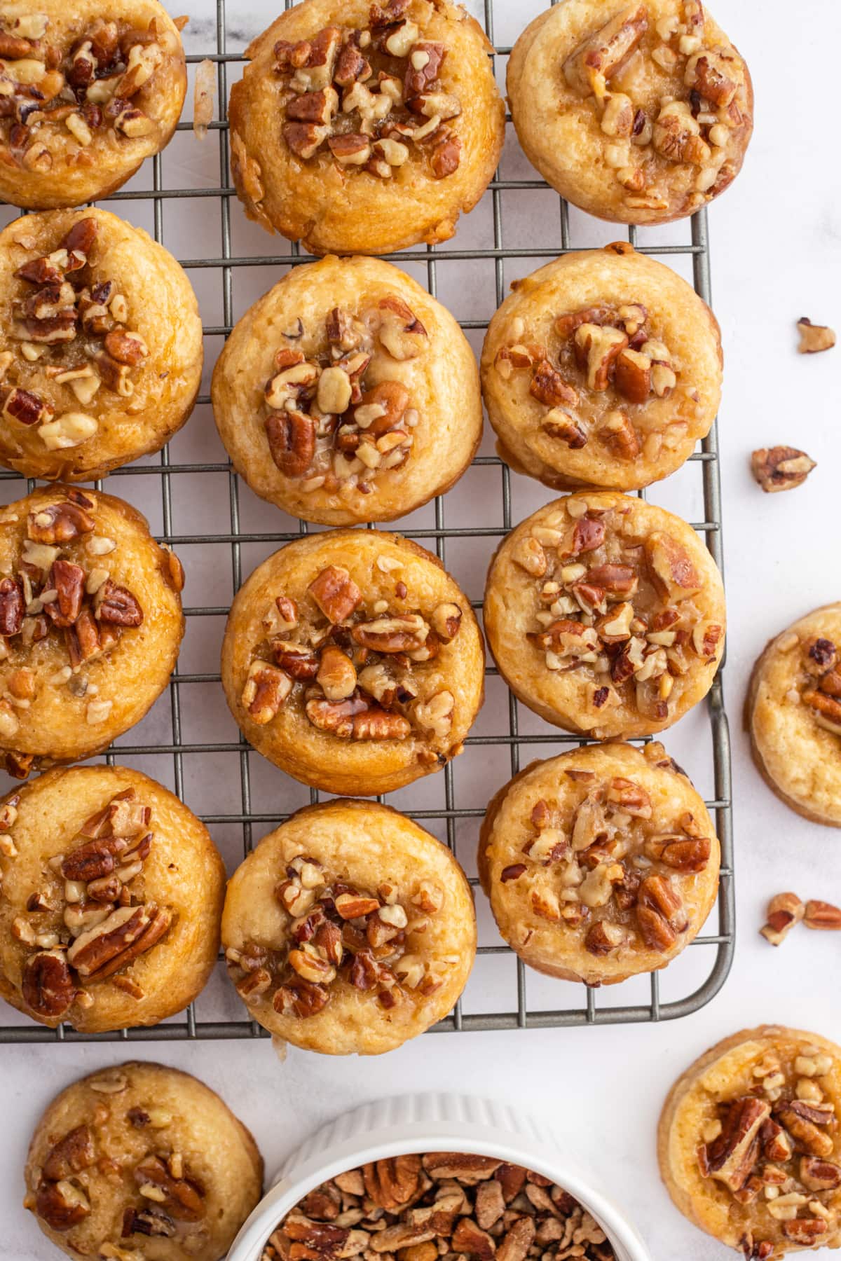 caramel pecan sticky bun cookies on a rack