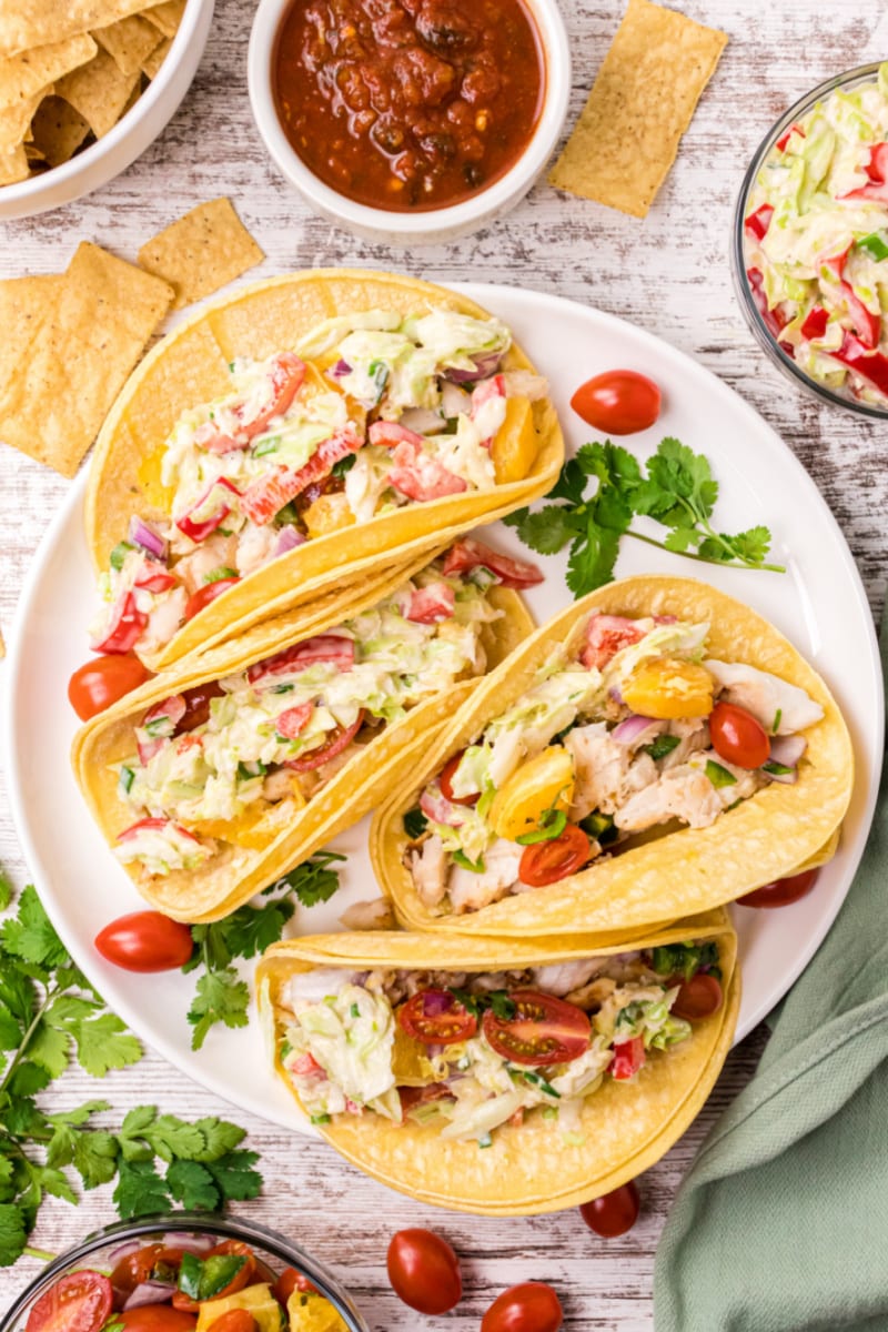 fish tacos with citrus salsa on a plate