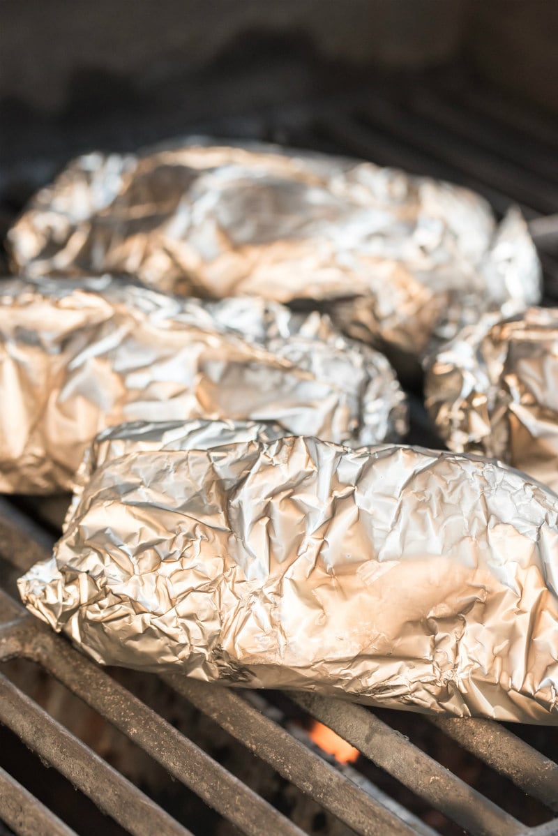 foil packets with seafood in them on the grill