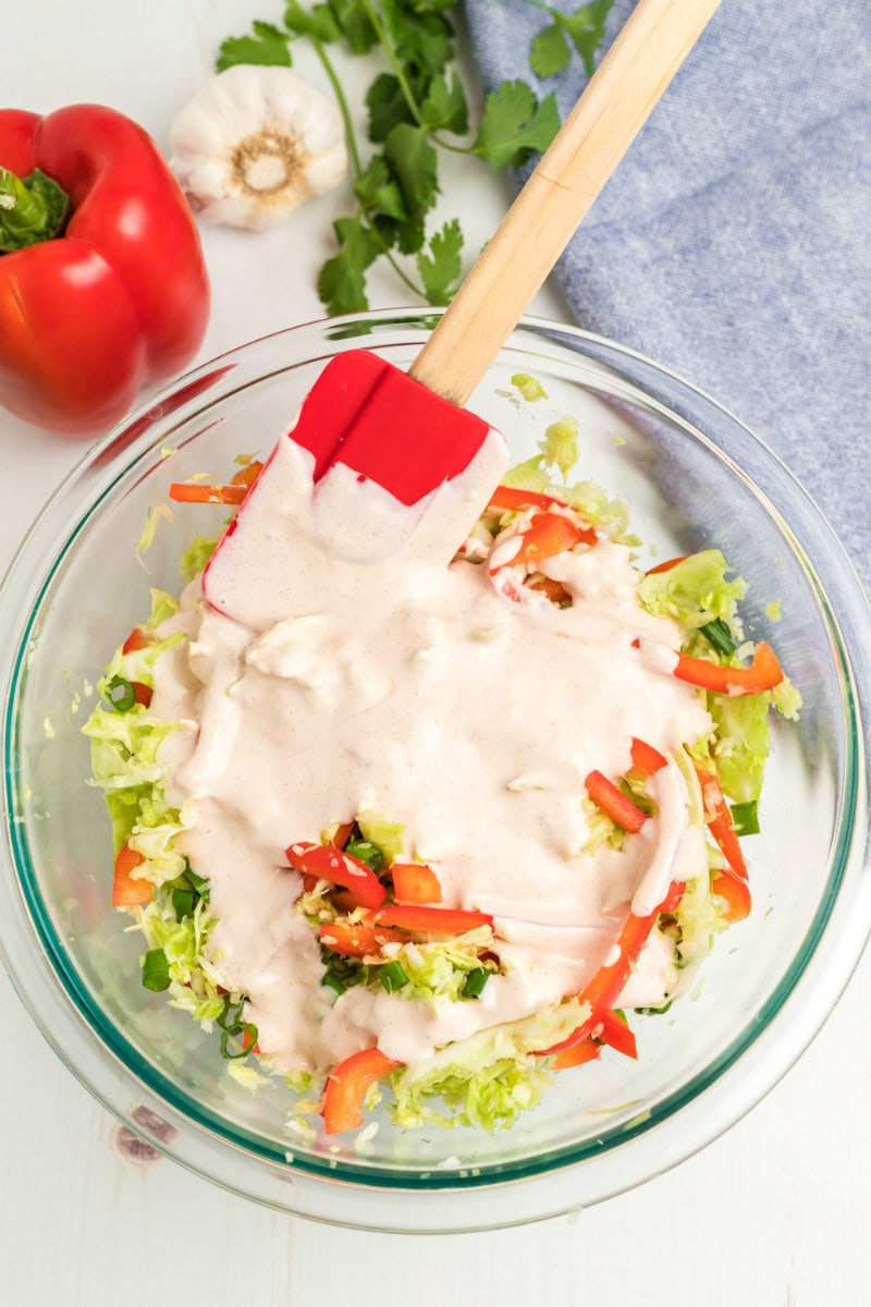 Adding dressing to Mexican Coleslaw