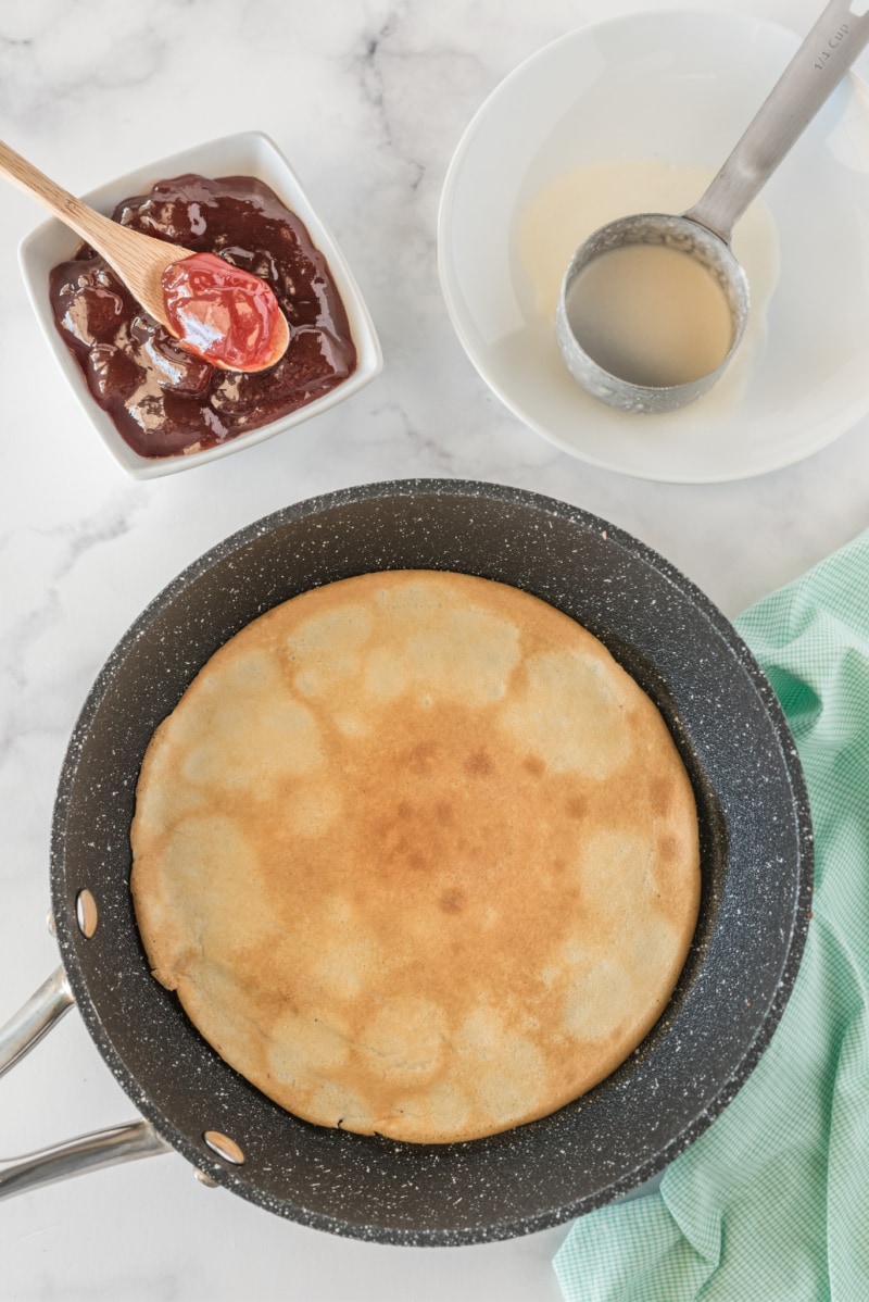 cooking pancakes in a pan