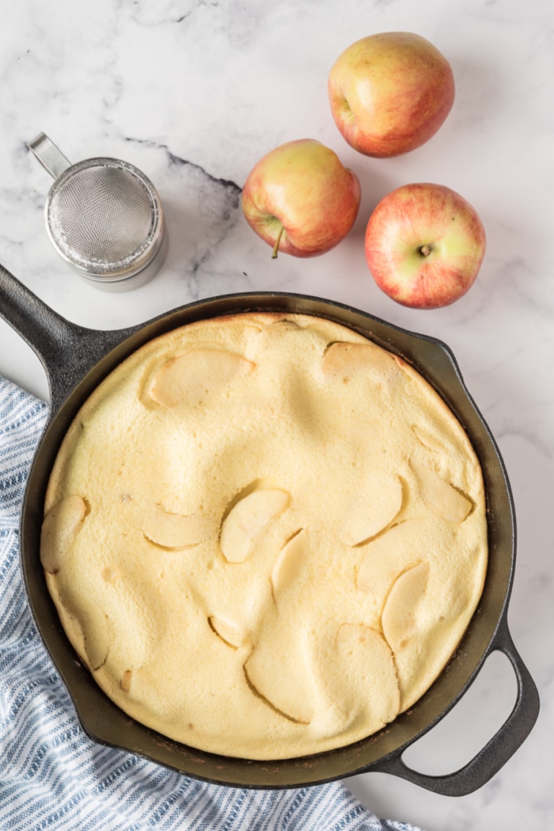 big apple pancake in cast iron skillet