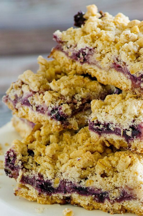 Lemon Blueberry Streusel Bars stacked on a platter