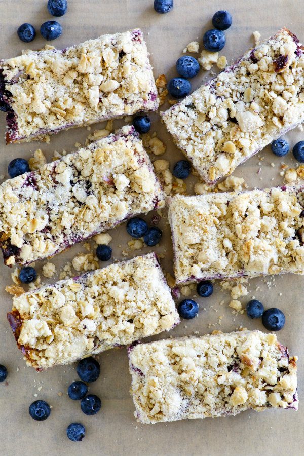 overhead shot of Lemon Blueberry Streusel Bars with fresh blueberries scattered around