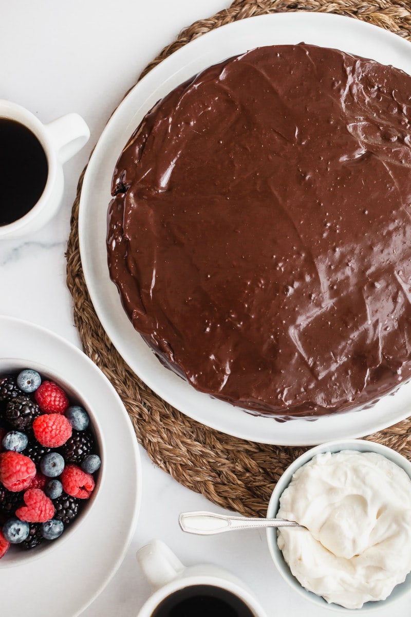 Chocolate Truffle Cake with whipped cream and berries