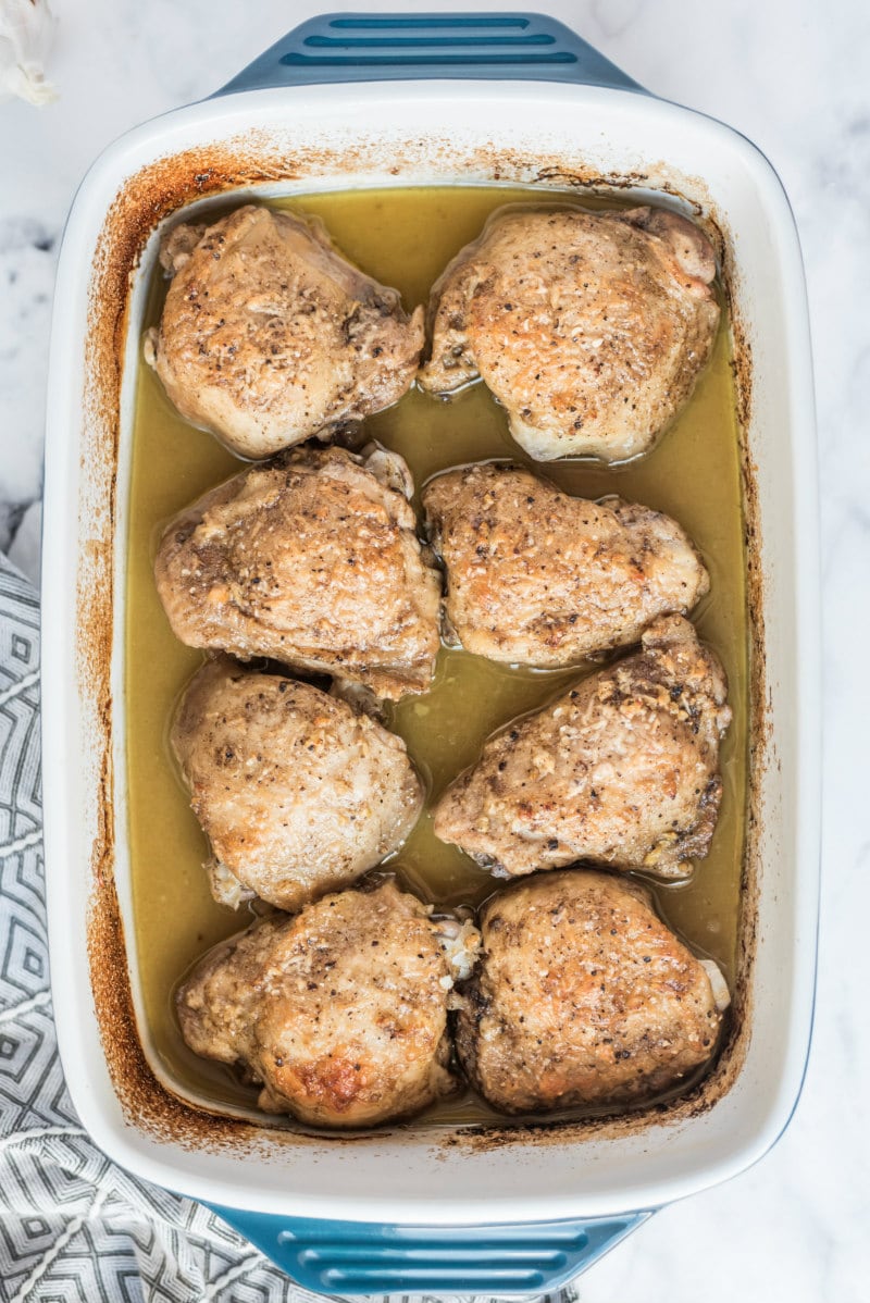 lemon parmesan chicken in white casserole dish