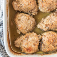 lemon parmesan chicken in white casserole dish