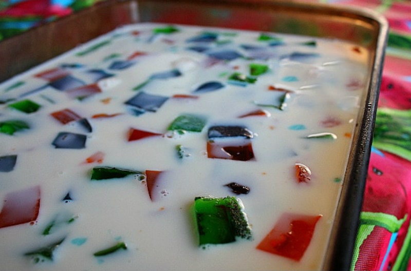 sea glass jello in a pyrex dish ready to go into the refrigerator