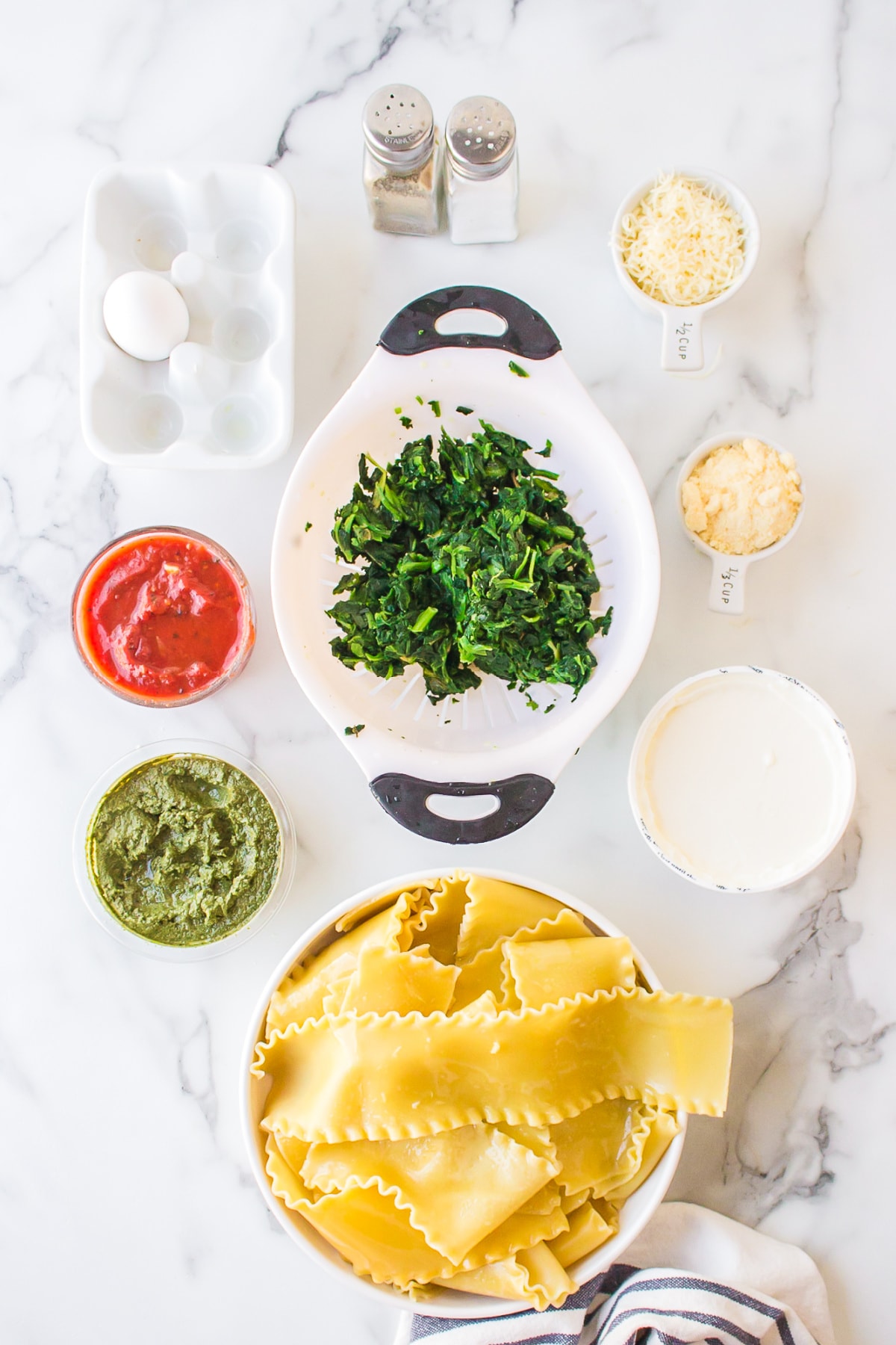 ingredients needed for making spinach pesto and cheese lasagna