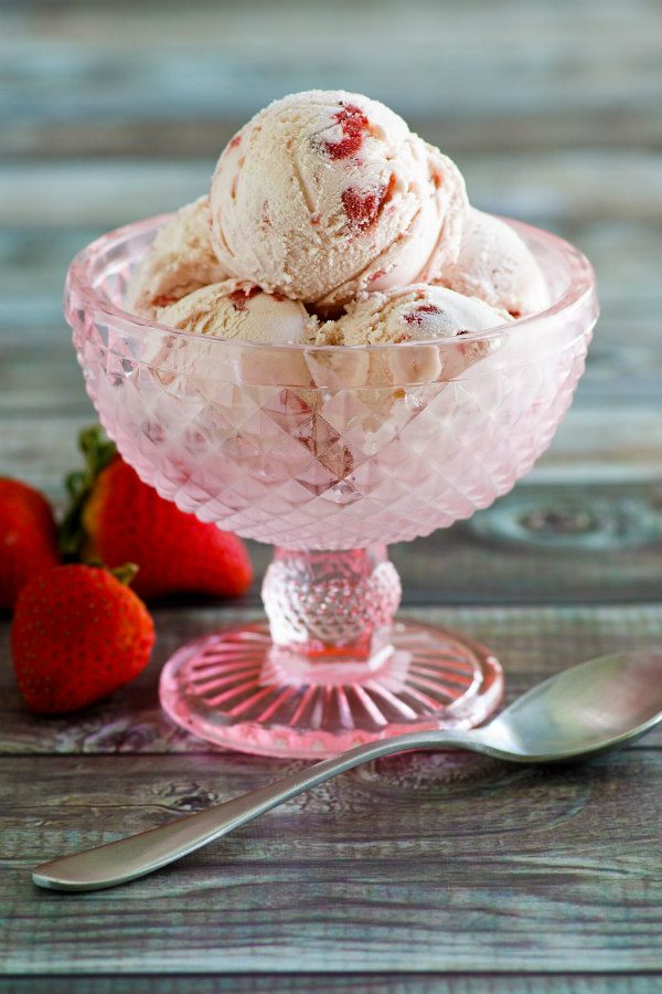 Scoops of No Cook Fresh Strawberry Ice Cream in a pink dish
