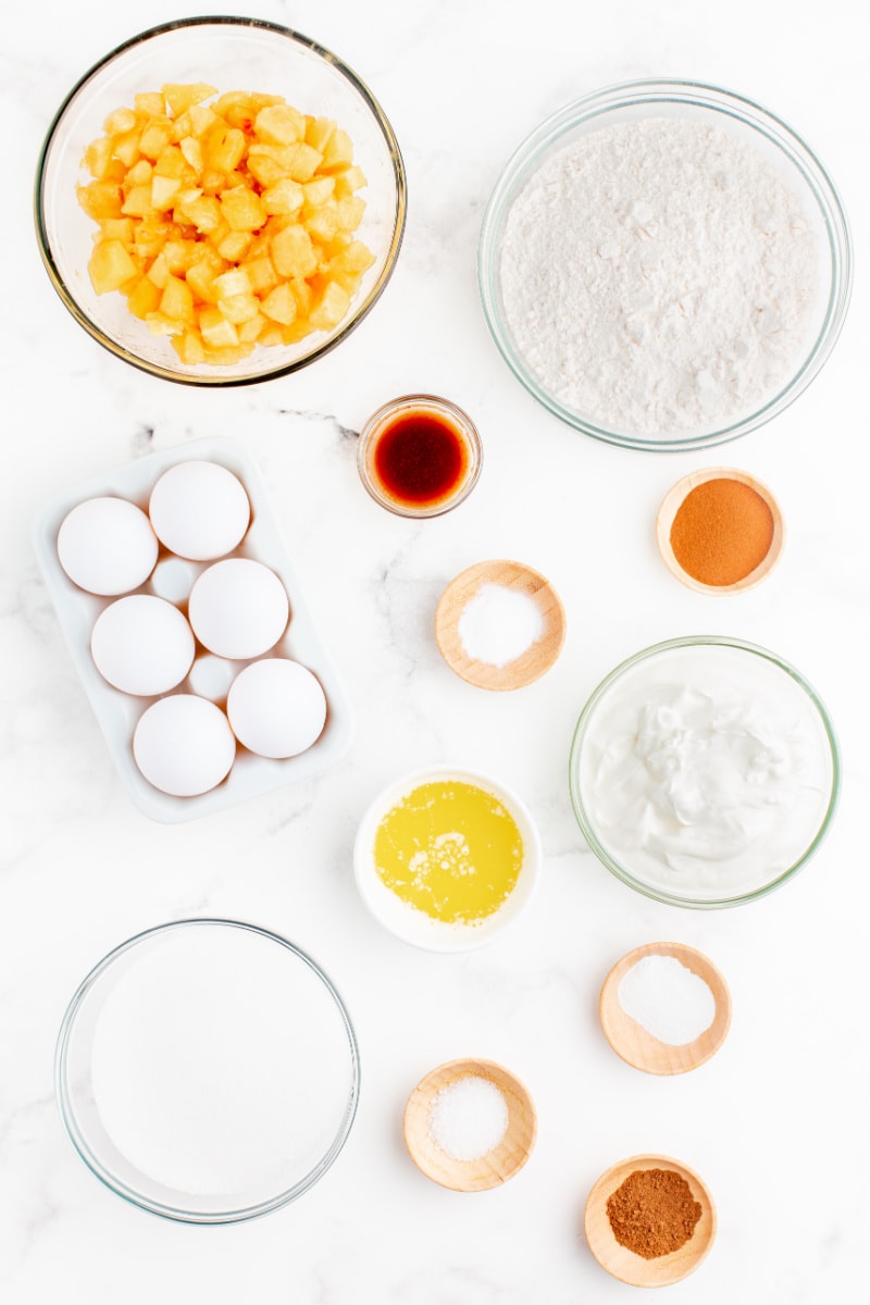 ingredients displayed for making sweet peach muffins