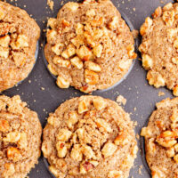 sweet peach muffins in a baking pan