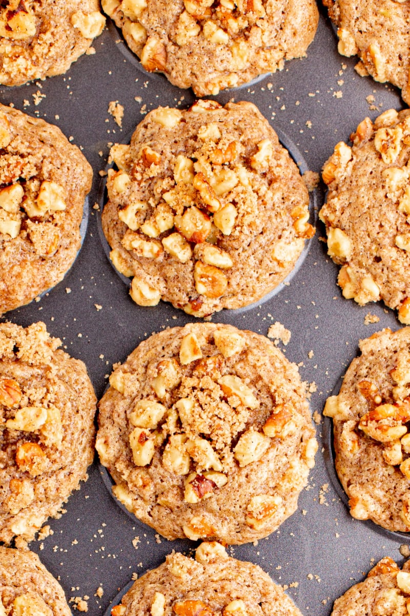 sweet peach muffins in a baking pan