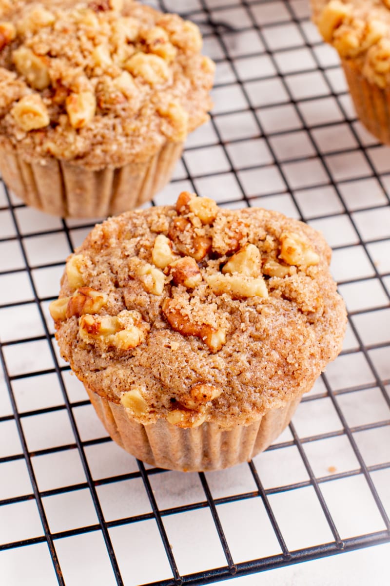 sweet peach muffins on a cooling rack