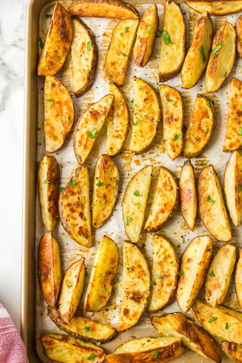 thick cut oven roasted fries on a baking sheet