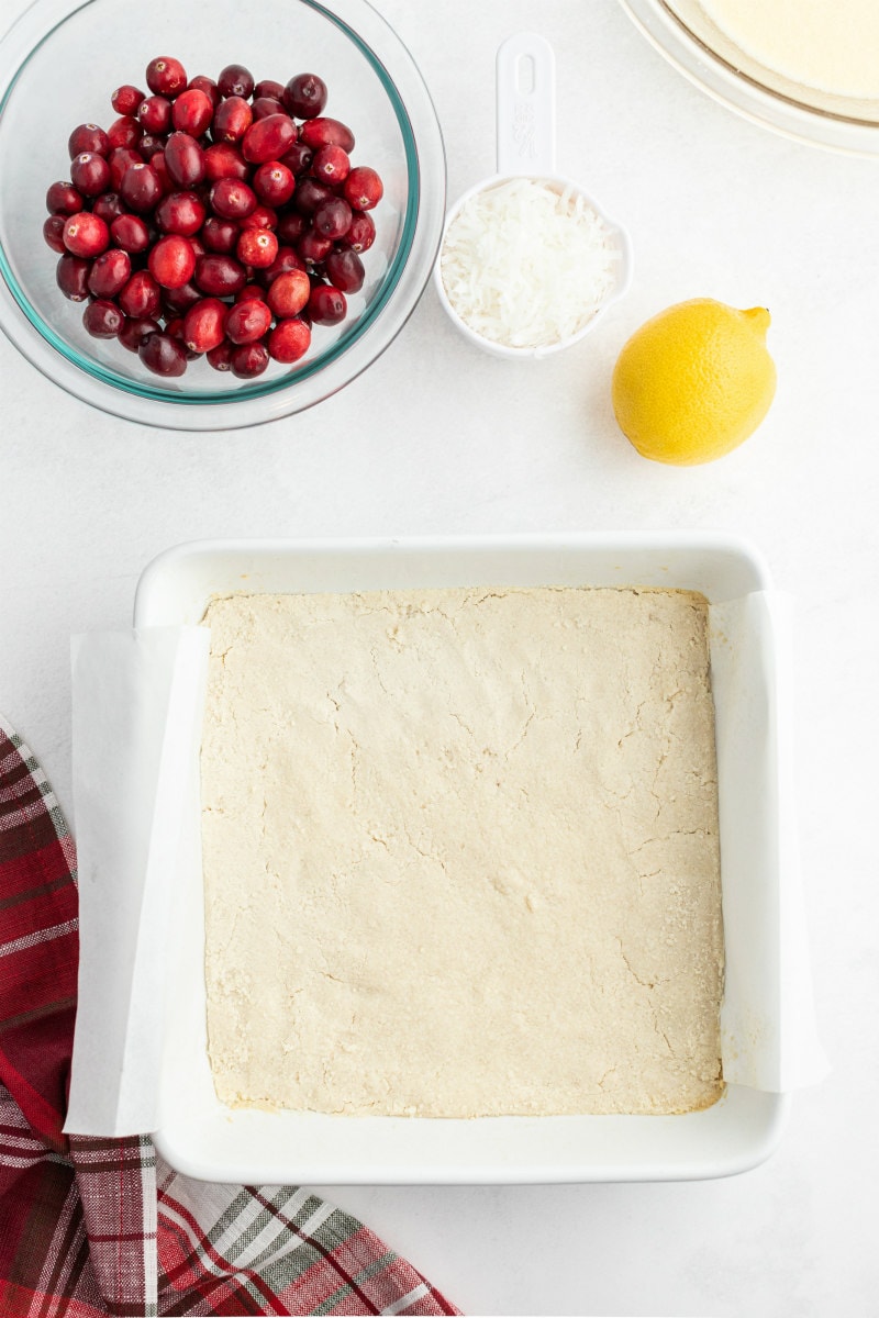 process of making cranberry coconut squares crust in pan