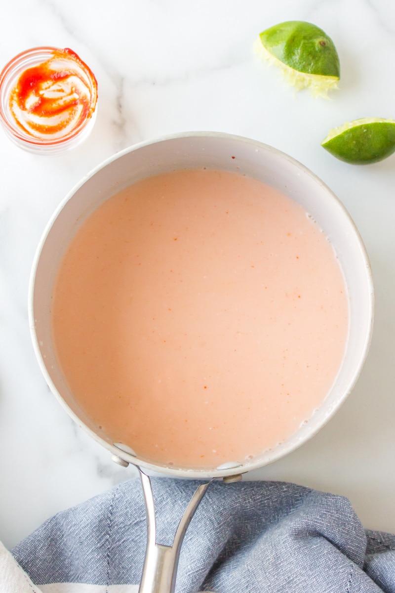 creamy coconut ginger sauce in a saucepan