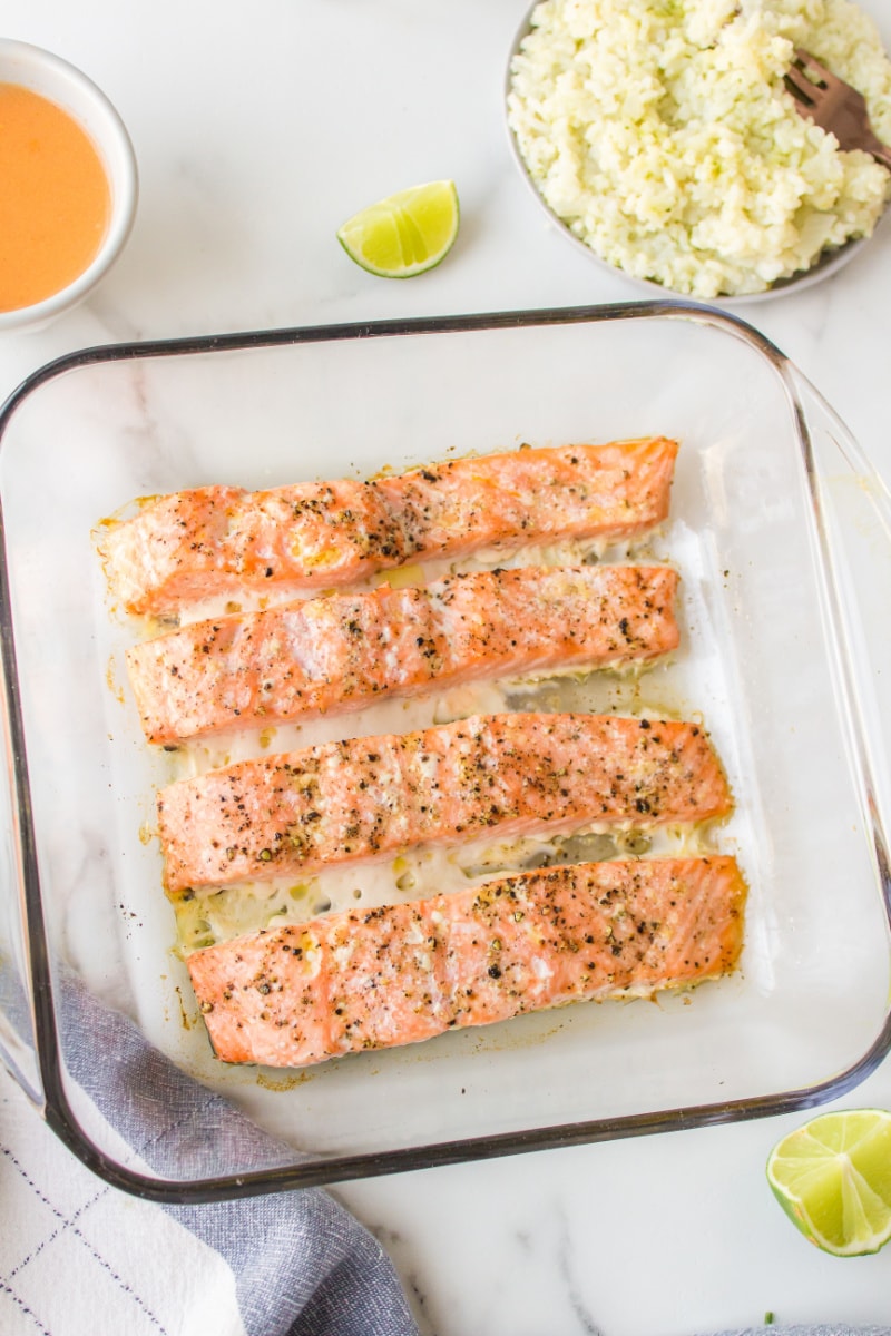 baked salmon fillets in a baking dish