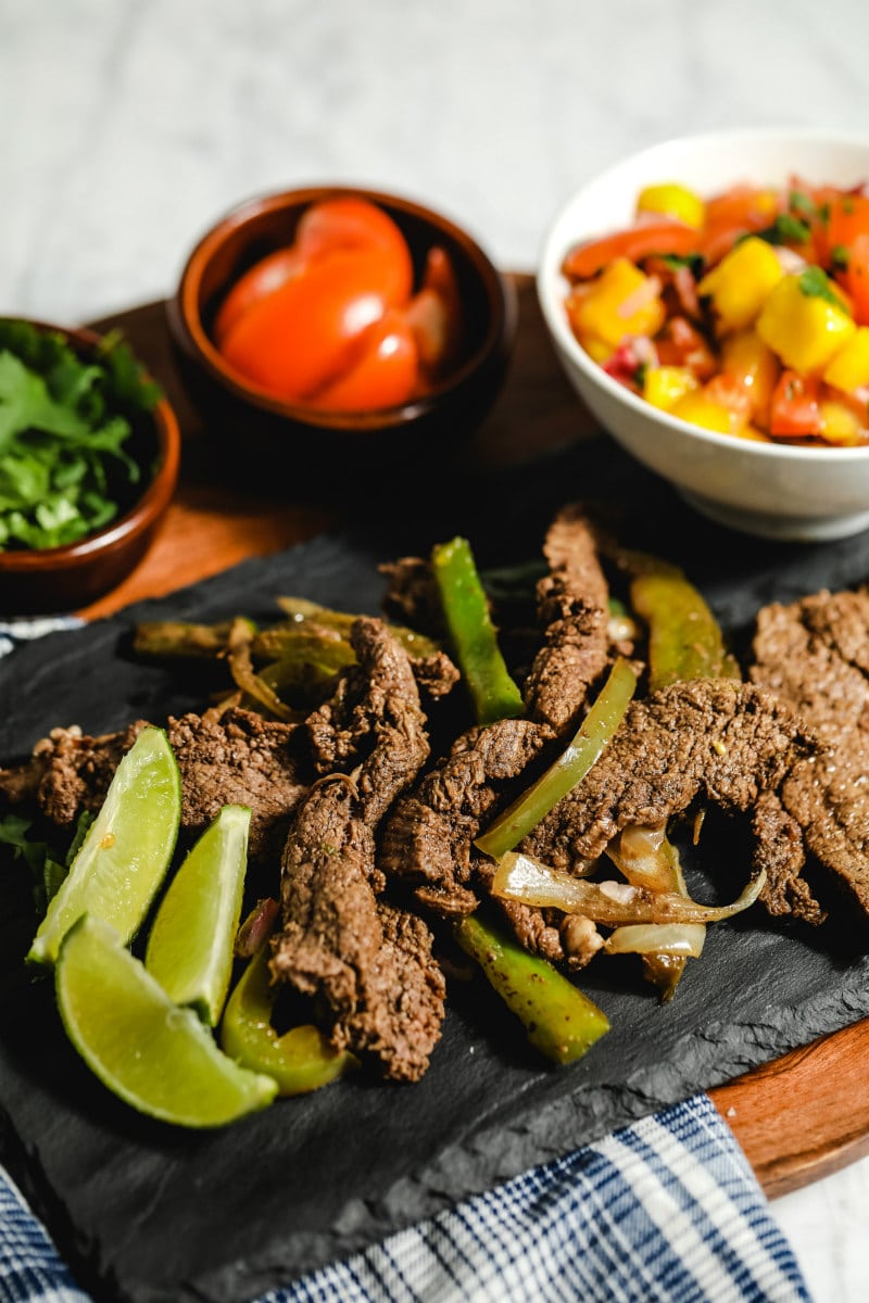 beef fajitas on a serving platter