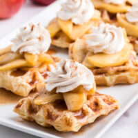 caramelized apple waffle pastries on white plate