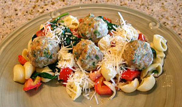 Cavatelli with Meatballs and Spinach on a plate