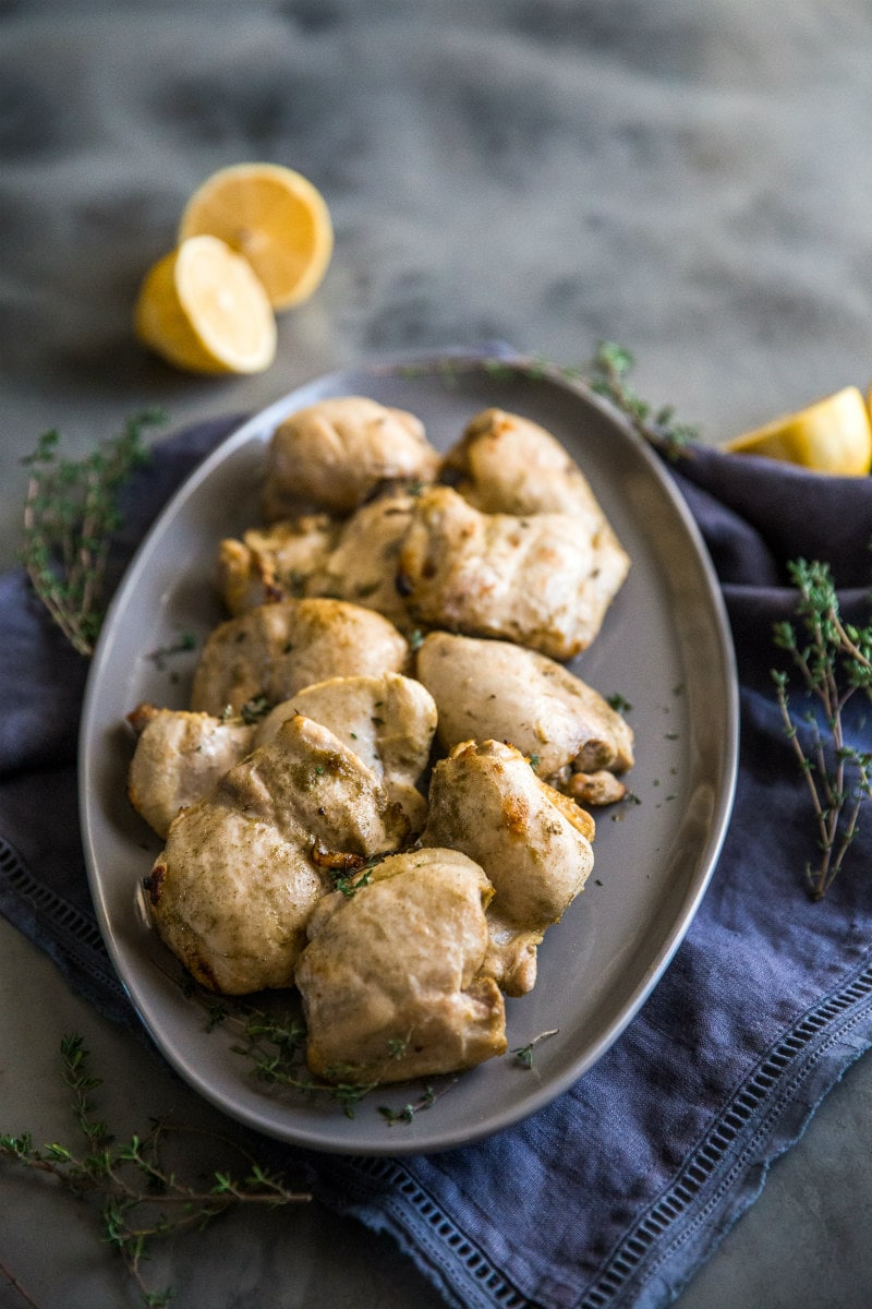 Platter of Grilled Chicken Thighs with Thyme and Lemon