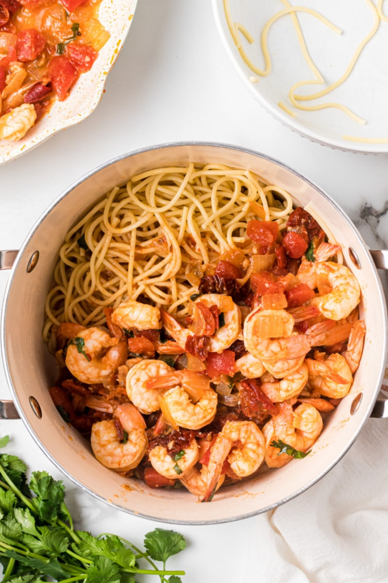pot of pasta with added shrimp