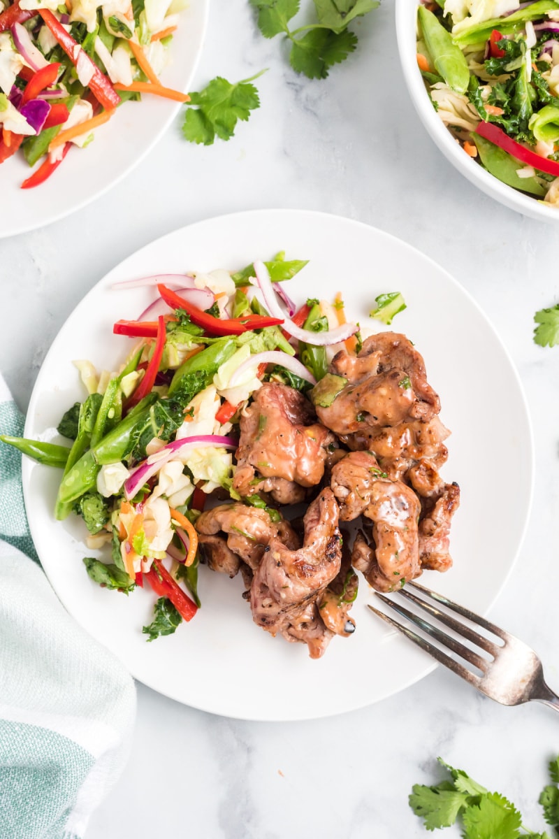 plate of coconut curry pork with veggies