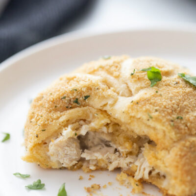 looking at inside croissant chicken on white plate