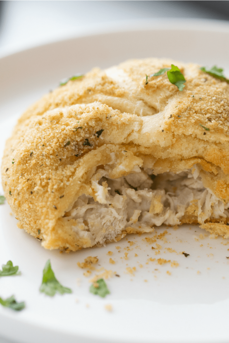 looking at inside crescent chicken on white plate