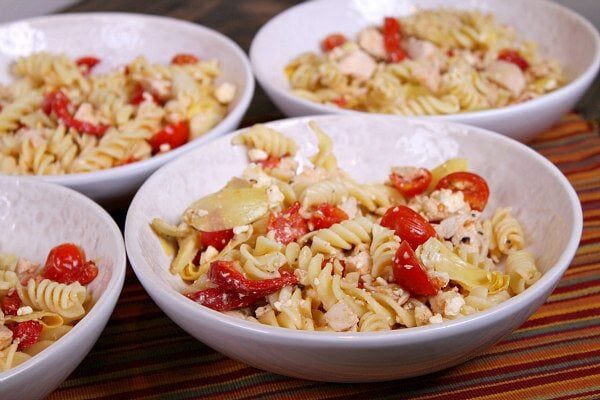 Greek Chicken Pasta recipe from RecipeGirl.com Greek Chicken Pasta in bowls