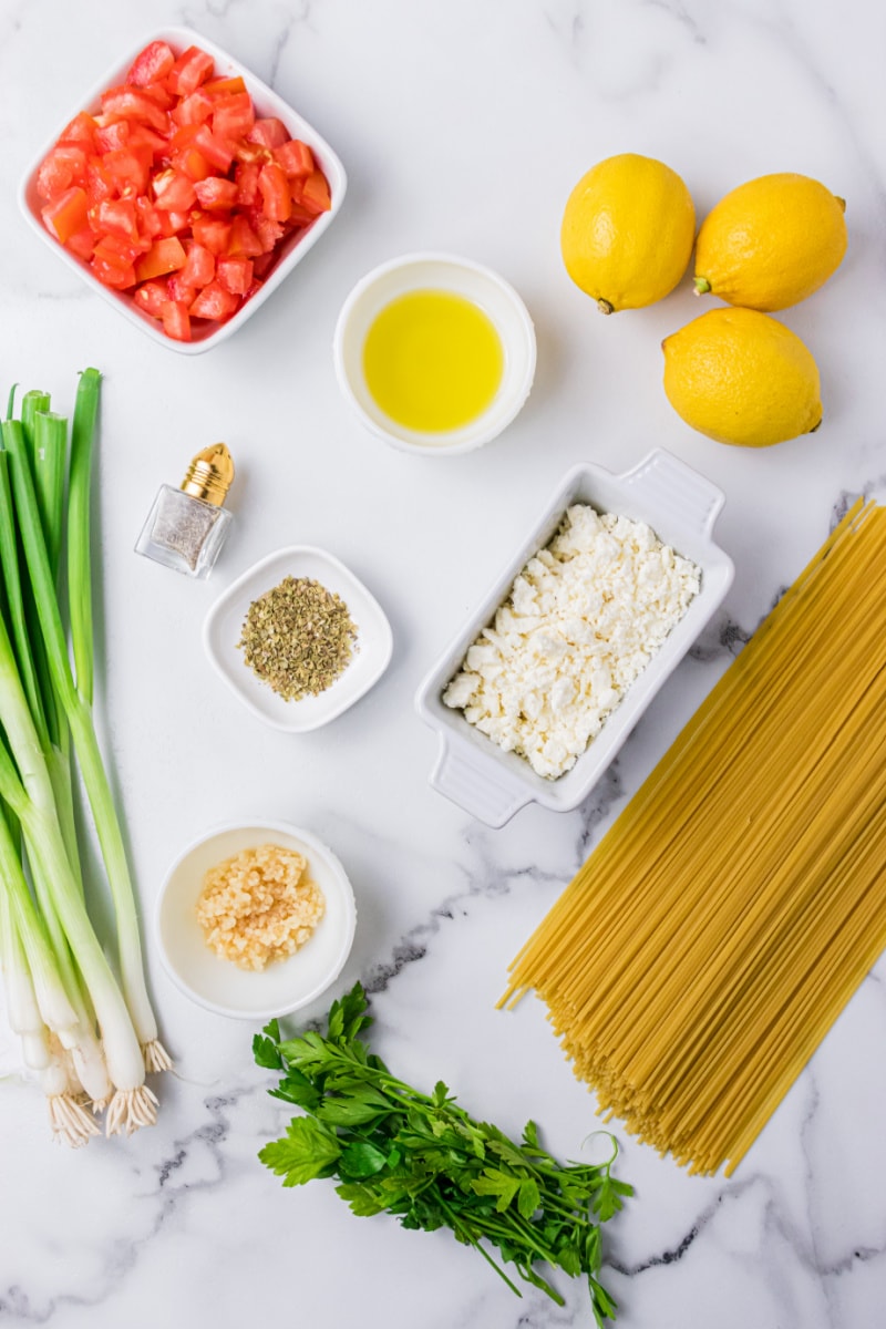 ingredients displayed for making greek spaghetti