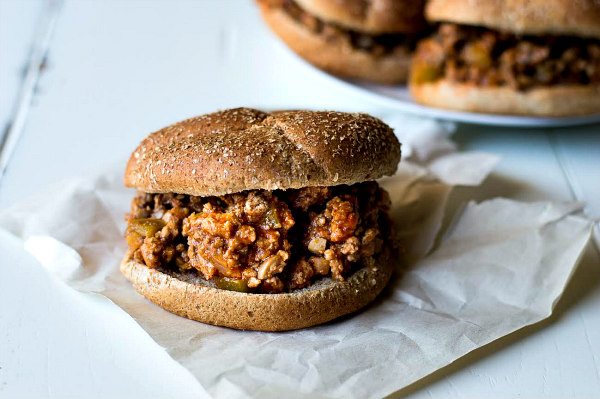 Low Fat Sloppy Joes recipe from RecipeGirl.com #lowfat #sloppy #joes #sloppyjoes #recipe #RecipeGirl Low Fat Sloppy Joe on a paper
