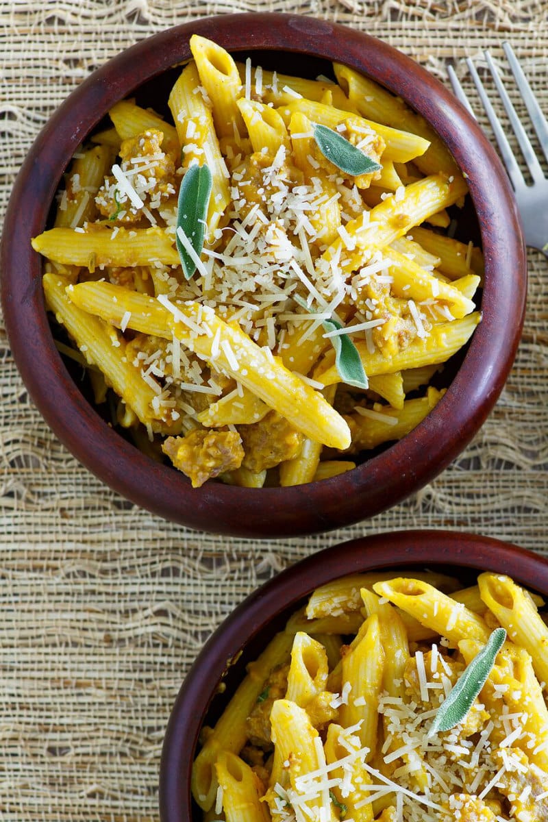 Pasta with Pumpkin and Sausage in serving dishes