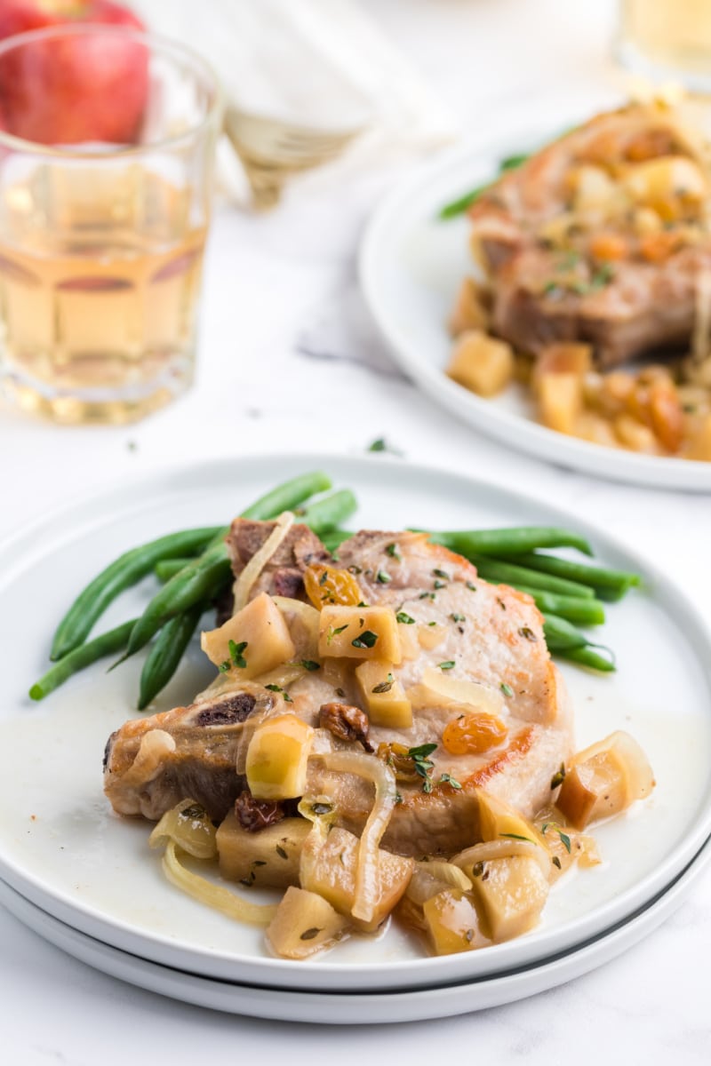 serving of smoked pork chops with maple baked apples on a plate