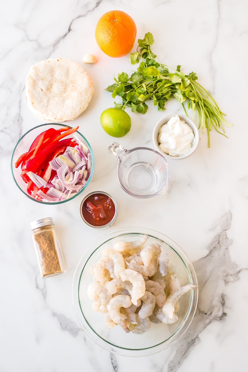 ingredients displayed for making tequila lime shrimp tacos