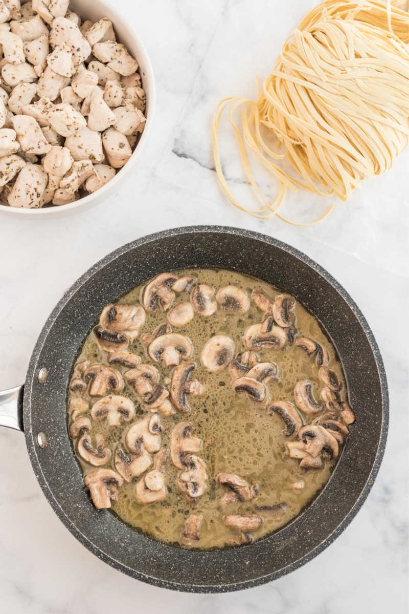 mushrooms cooking in pan