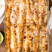 zucchini beef enchiladas in a baking dish