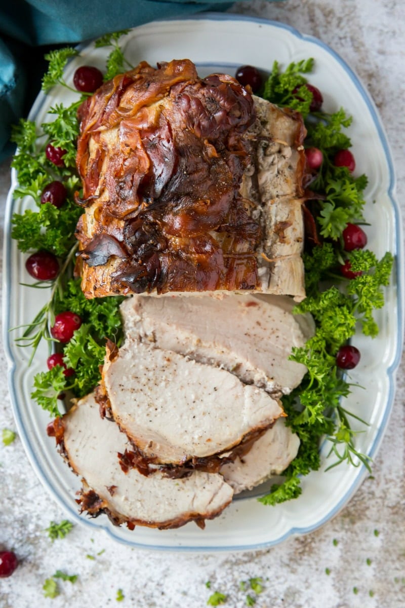 Pancetta Wrapped Pork Roast on a serving platter