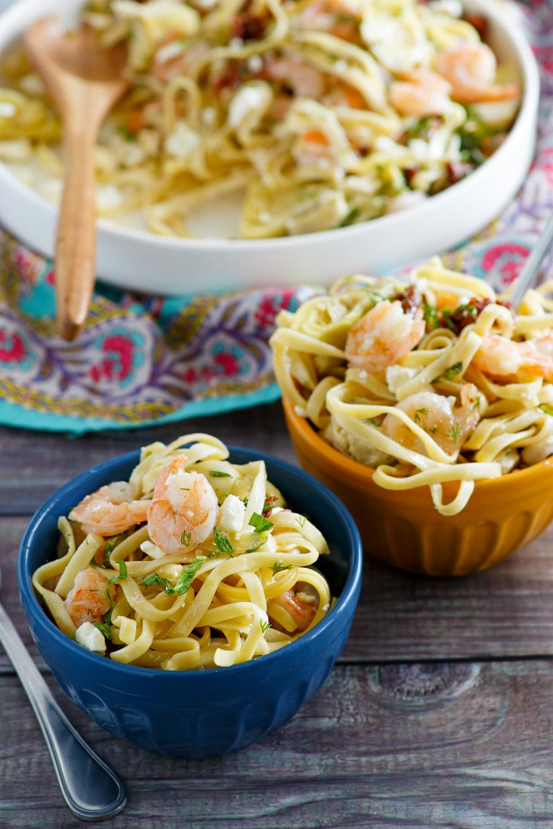 bowls of pasta with shrimp and feta